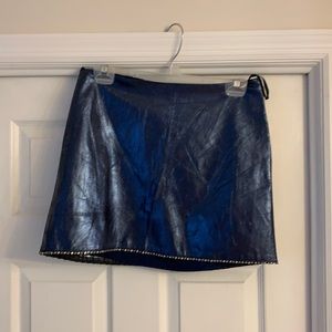 A short royal blue leather skirt.